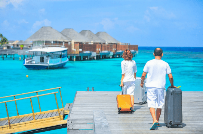 man-and-woman-walks-on-dock