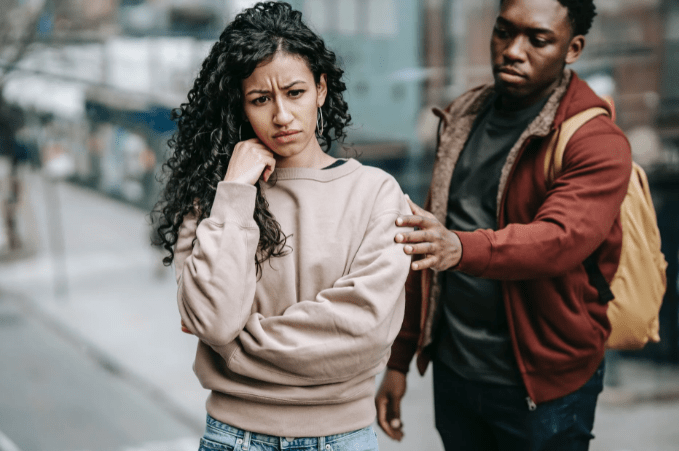 multiracial-couple-arguing-with-each-other-in-street