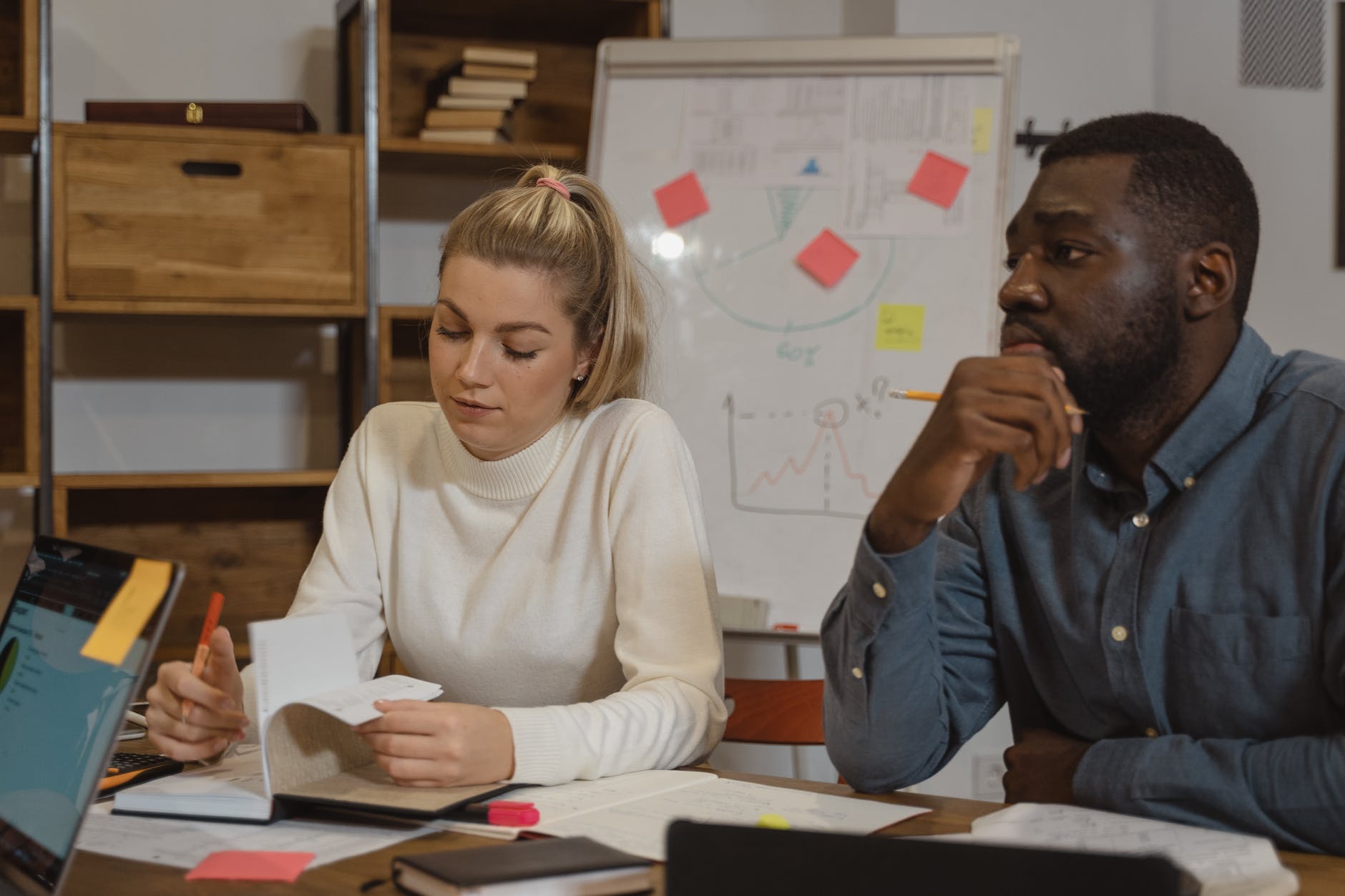 two individuals taking care of personal space at work