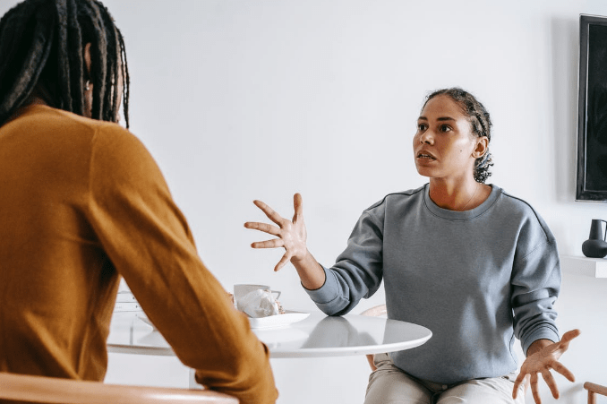 african-american-couple-arguing-at-table