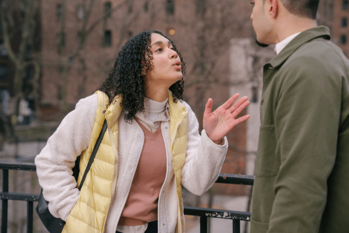 young-ethnic-couple-arguing-on-street